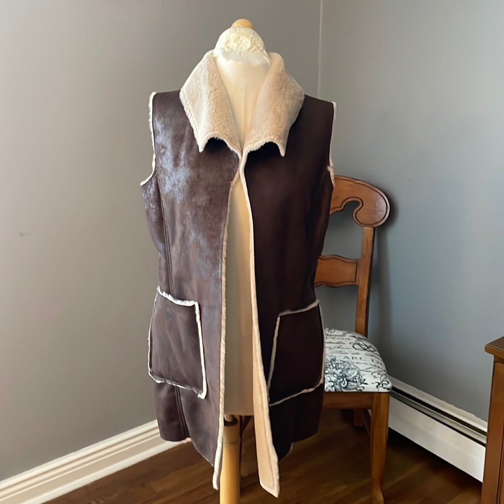 Weatherproof Faux Leather long vest. Super soft inside. Big pockets